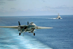 US hawks slam Obama as world awaits Syria strike