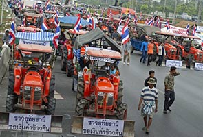 Thai rice farmers call off airport protest