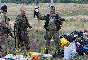 MH17: Anger boils over reports of looting at crash site