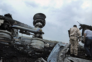 MH17: Crew's families react to crash reports