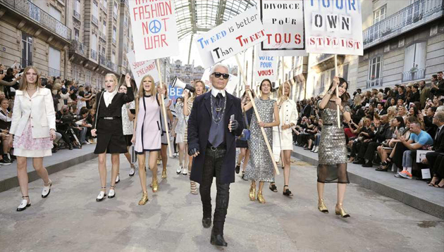 Karl Lagerfeld turns the Chanel catwalk into a (stylish) feminist demonstration.