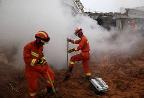 Number of missing in China landslide climbs to 91 - state TV