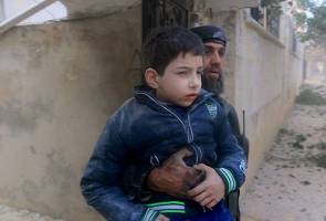 Suspected Russian warplanes kill scores in Syrian city - rescue workers