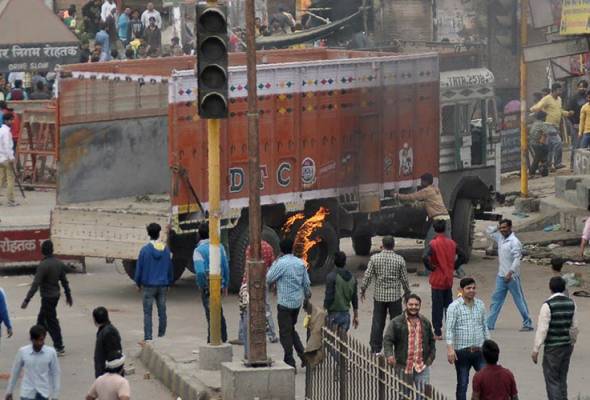 Death toll from India caste riots rises to 19