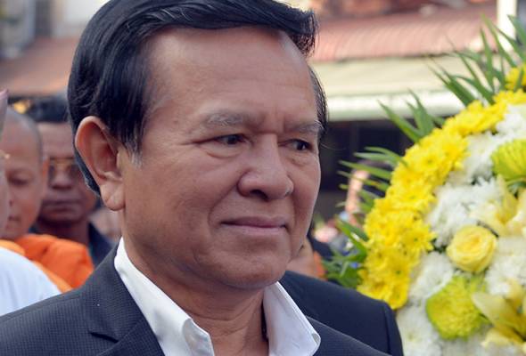 Cambodia charges six as MP 'sex scandal' deepens