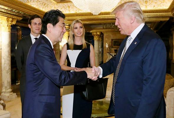 Trump's daughter sits in on landmark Japan PM talks