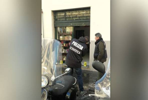 Parcel bomb at far-right bookshop wounds Italian policeman