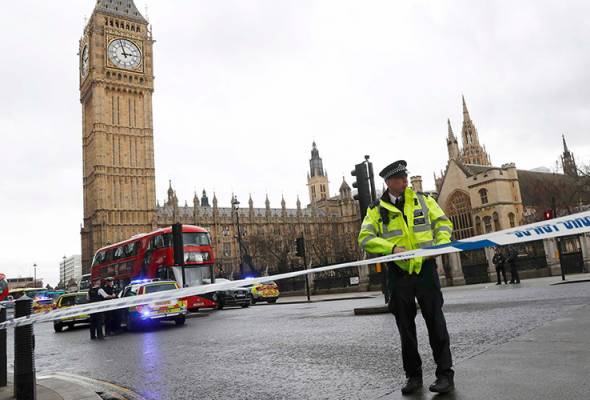 Assailant who stabbed policeman inside UK parliament has been shot - lawmaker