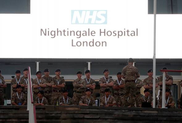 UK opens new hospital erected in conference centre to fight coronavirus