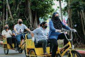 OKU cacat penglihatan seronok diberi peluang berbasikal