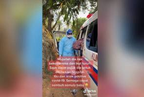 COVID-19: Menyentuh hati, video petugas kesihatan pujuk dua beranak Orang Asli tular