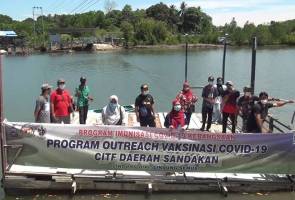Vaksin COVID-19: Penduduk kampung sanggup naik feri manual untuk ke PPV