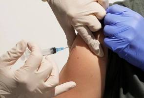 More than 18 million of Malaysia's adult population fully vaccinated
