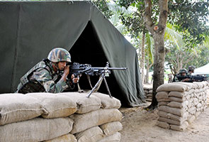 Pencerobohan Lahad Datu: Tiga pertempuran meletus di Kampung Tanduo, kata saksi Pencerobohan Lahad Datu: Tiga pertempuran meletus di Kampung Tanduo, kata saksi