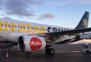 AirAsia jalin kerjasama Interpol banteras jenayah global AirAsia jalin kerjasama Interpol banteras jenayah global