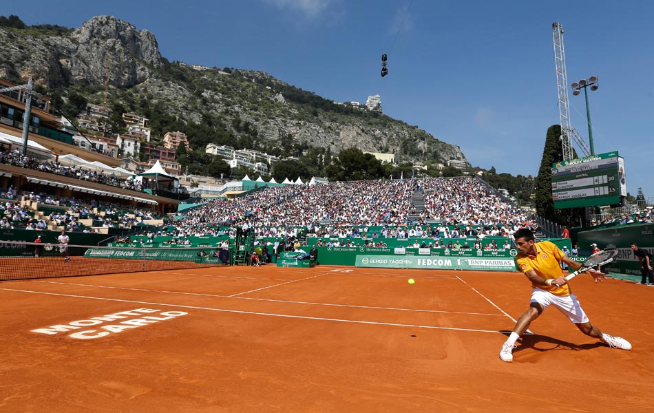 Novak Djokovic dari Serbia bermain bersama Albert Ramos Vinolas Sepanyol dalam perlawanan mereka semasa kejohanan Monte Carlo Masters Tenis di Monaco pada 14 April, 2015 . AP Photo/Lionel Novak Djokovic dari Serbia bermain bersama Albert Ramos Vinolas Sepanyol dalam perlawanan mereka semasa kejohanan Monte Carlo Masters Tenis di Monaco pada 14 April, 2015 . AP Photo/Lionel