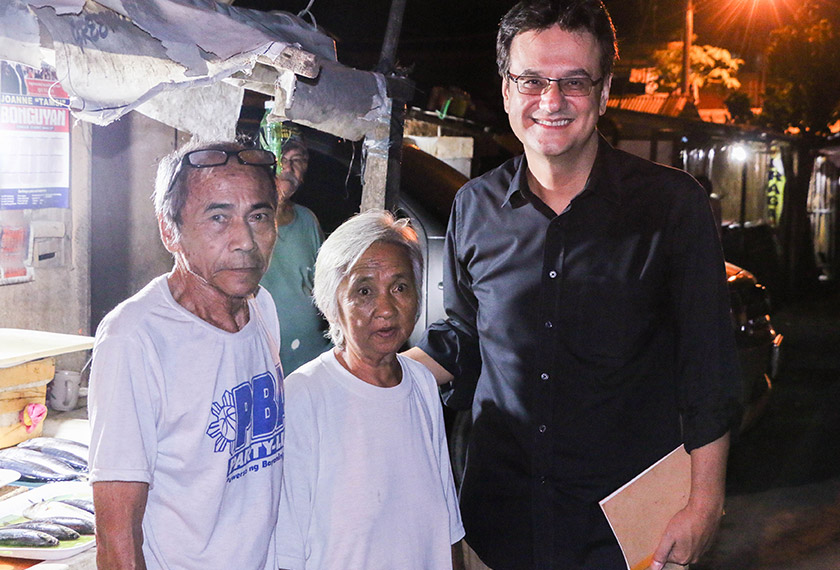 Karim with Barangay leader and Duterte supporter, Mang Remy, and his wife. - Karim Raslan Photo