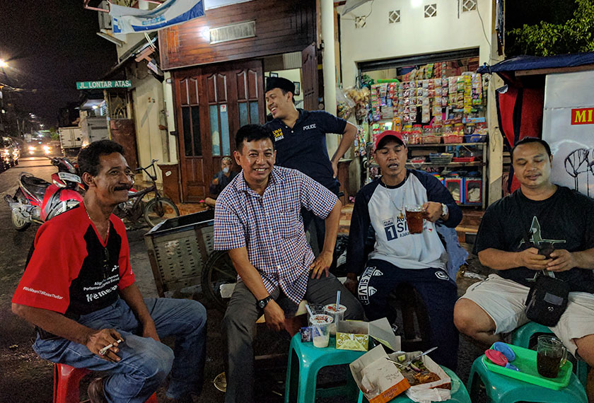 Folks hanging out together despite each of them supporting different candidates for the election slated to be held in February 2017. They call this place 'democratic space'. - Karim Raslan Photo