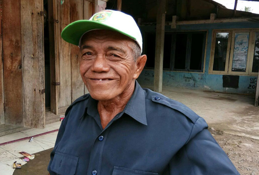 Pak Teguh has been working on the banks of the Musi River since 1970 when he was only 18  years old. The river is his livelihood, helping him earn IDR100,000 on a good day. - Photo by Karim Raslan