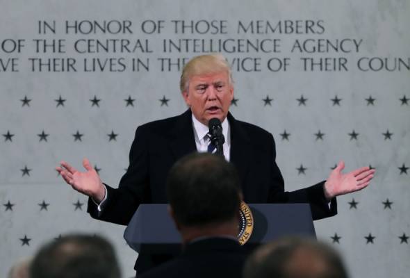 Denying feud over Russia hacking, Trump vows support to CIA Denying feud over Russia hacking, Trump vows support to CIA