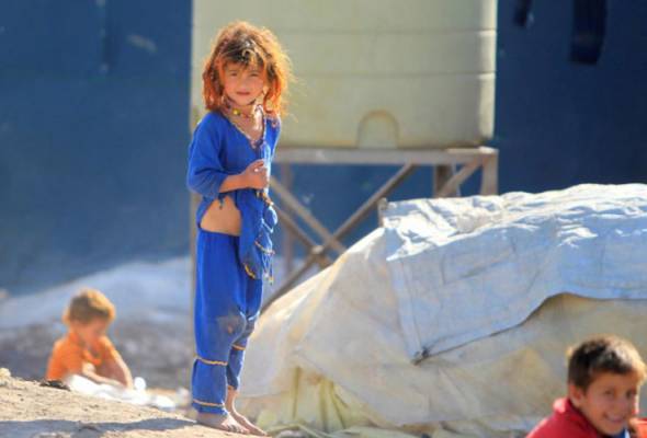 Syrian child refugees taught to release stress and resist recruitment Syrian child refugees taught to release stress and resist recruitment
