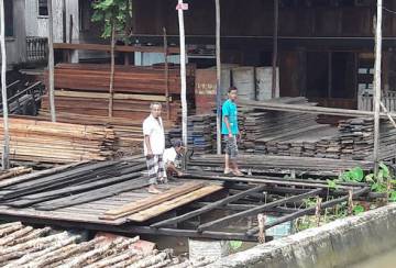 Pak Teguh dan Sungai Musi