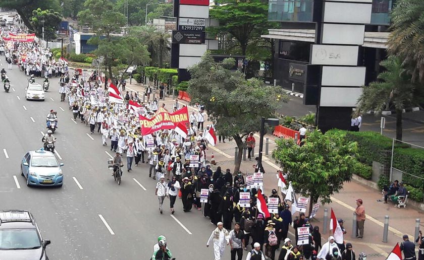 People seen marching through the streets of Jakarta, demonstrating against then-Governor Basuki Tjahaja Purnama’s (or “Ahok”) “blasphemous” statements. - Karim Raslan Photo