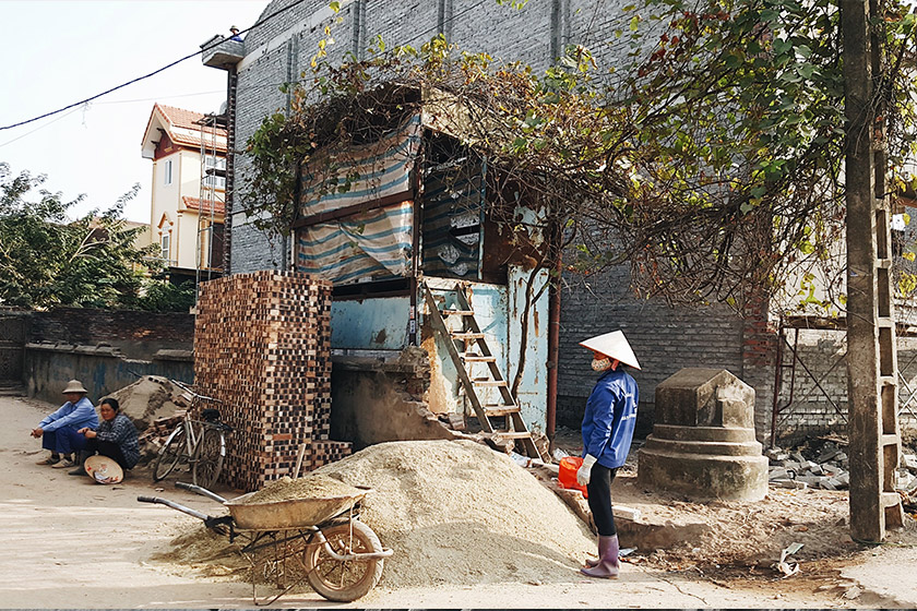 A labourer seen outside the Tham Loi steel facility in Da Hoi district