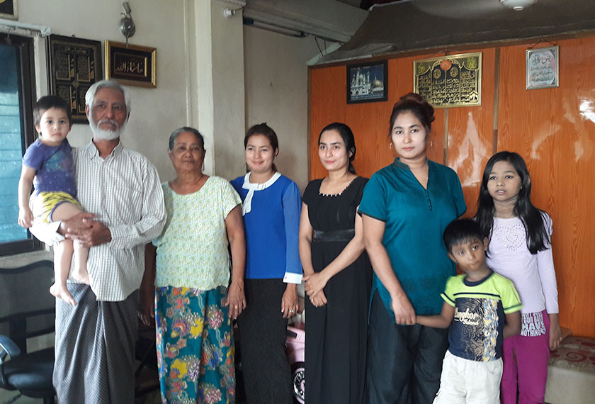 U Tin Win with his family in their home in Yangon. - Photo by Karim Raslan