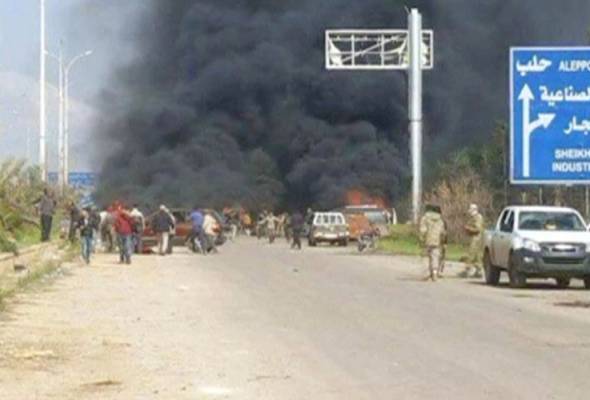 Puluhan maut dalam serangan bom terhadap konvoi bas di Aleppo Syria Puluhan maut dalam serangan bom terhadap konvoi bas di Aleppo Syria