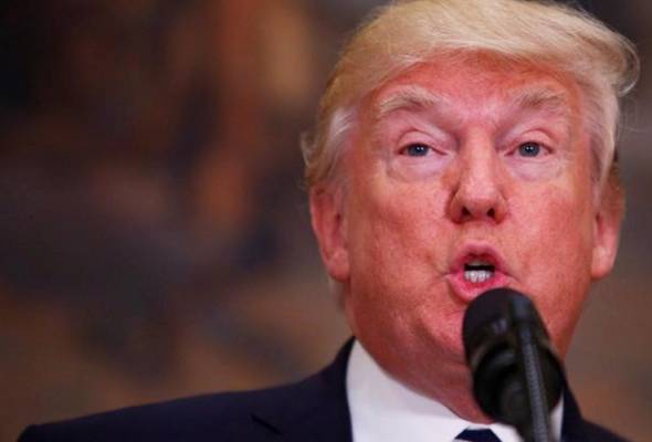 Before Putin talks, Trump plays down interference in U.S. election Before Putin talks, Trump plays down interference in U.S. election