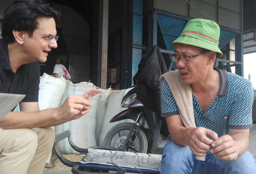 Karim speaks to Pak Darwin, a Chinese Indonesian rice miller in the city of Medan, North Sumatra. - Karim Raslan Photo