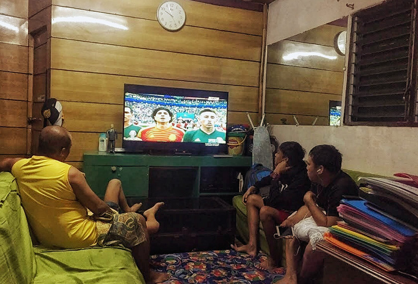 Not everyone goes out to watch a live stream of the World Cup matches. In Davao, Philippines, where other sports like boxing and basketball are more popular, outdoor football watching crowds are a rare sight.