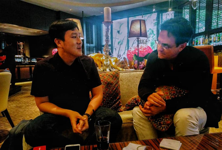 Martino Tan, co-founder of Mothership.SG discussing the lack of Opposition strength and popularity to Karim Raslan, Founder of KRA Group. Hezril Azmin/Ceritalah