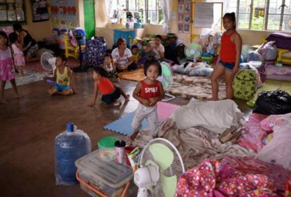Bayi lapan bulan mangsa pertama Taufan Mangkhut Bayi lapan bulan mangsa pertama Taufan Mangkhut