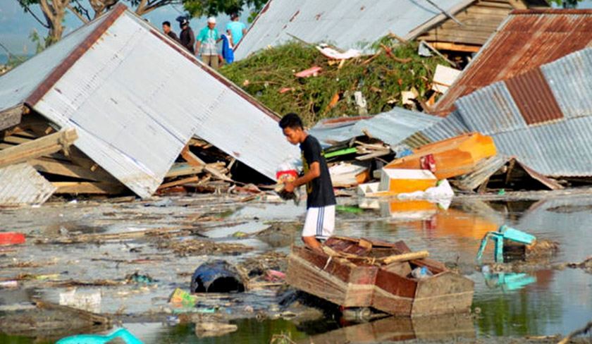 The effect of liquefaction is devastating, forming swamps and sucking in entire villages. (AP Photo)