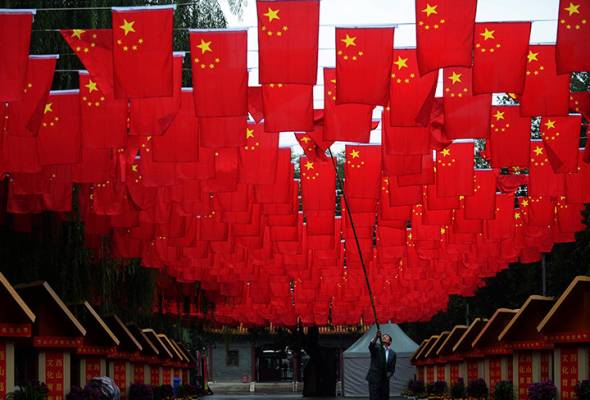 China willing to make effort for peaceful 'reunification' with Taiwan