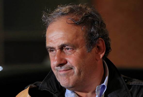 Michel Platini dibebaskan Michel Platini dibebaskan