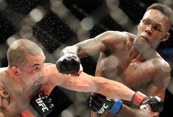UFC 243: Adesanya tumbangkan Whittaker, raih kejuaraan dunia middleweight UFC 243: Adesanya tumbangkan Whittaker, raih kejuaraan dunia middleweight