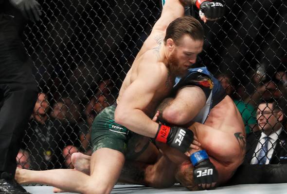 McGregor hanya perlukan 40 saat tumbangkan 'Cowboy' Cerrone McGregor hanya perlukan 40 saat tumbangkan 'Cowboy' Cerrone