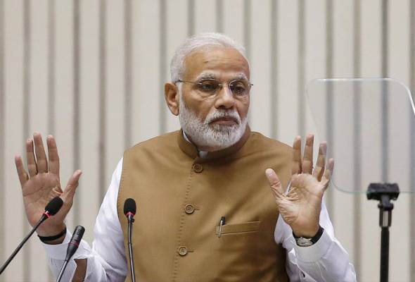 India police detain students gathered to watch BBC documentary on Modi