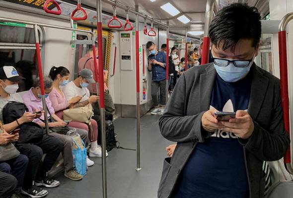 COVID-19: Hong Kong wajibkan penggunaan pelitup muka COVID-19: Hong Kong wajibkan penggunaan pelitup muka
