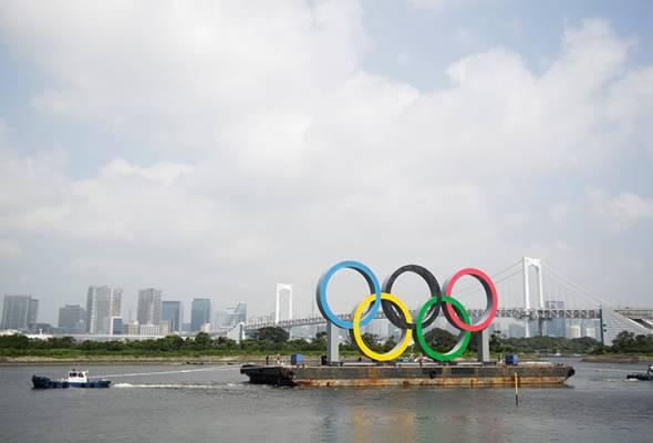 Papan tanda Olimpik Tokyo dialih bagi tujuan penyelenggaraan Papan tanda Olimpik Tokyo dialih bagi tujuan penyelenggaraan
