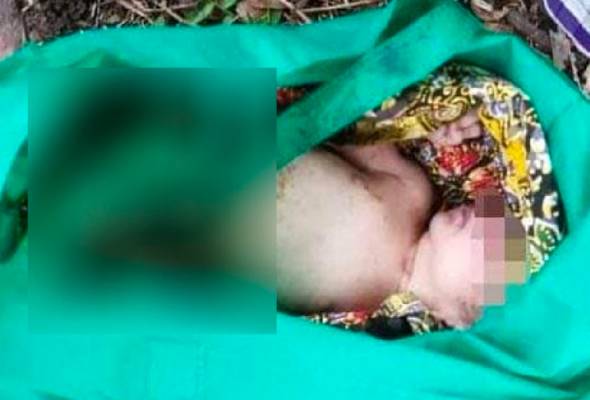 Bayi perempuan diletak dalam beg ditinggalkan di tepi jalan Bayi perempuan diletak dalam beg ditinggalkan di tepi jalan