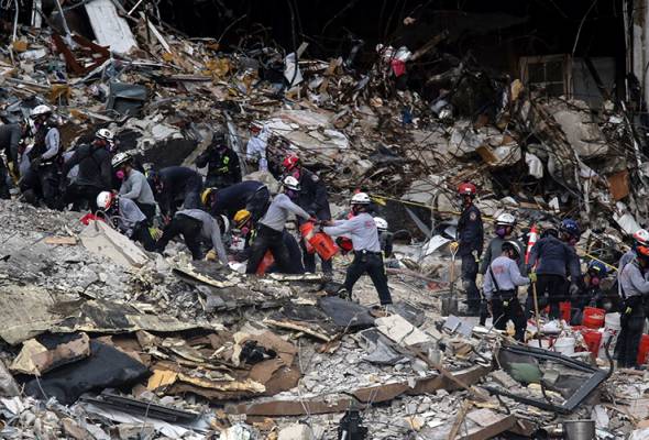 Death toll in Florida building collapse rises to 12 with 149 missing ...