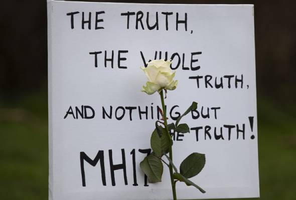 Relatives of MH17 victims call for clarity on Russia's role in crash