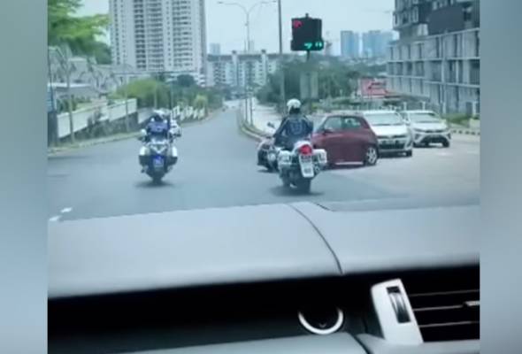 Police probe on viralled video of traffic policemen escorting private vehicle