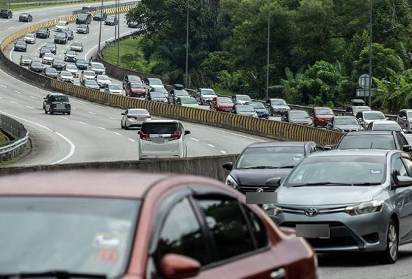 Slow-moving traffic on several highways leading into KL