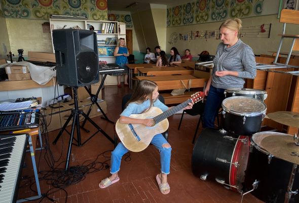 From the debris of shattered Ukraine, the healing song of children