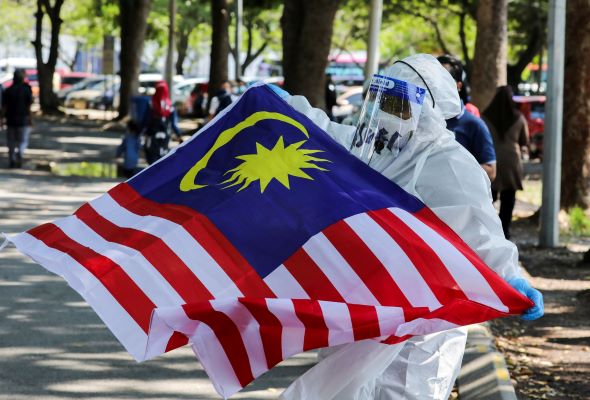 Malaysia's daily COVID-19 cases fall to lowest since June